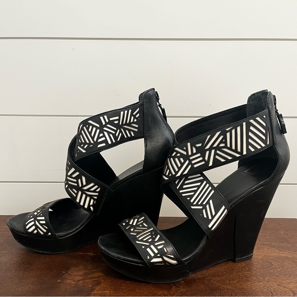 Gently used Diane von Furstenberg black and white pattern wedges